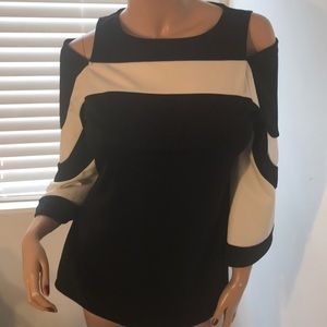 Black and White cold shoulder top Size: Lg; NWOT
